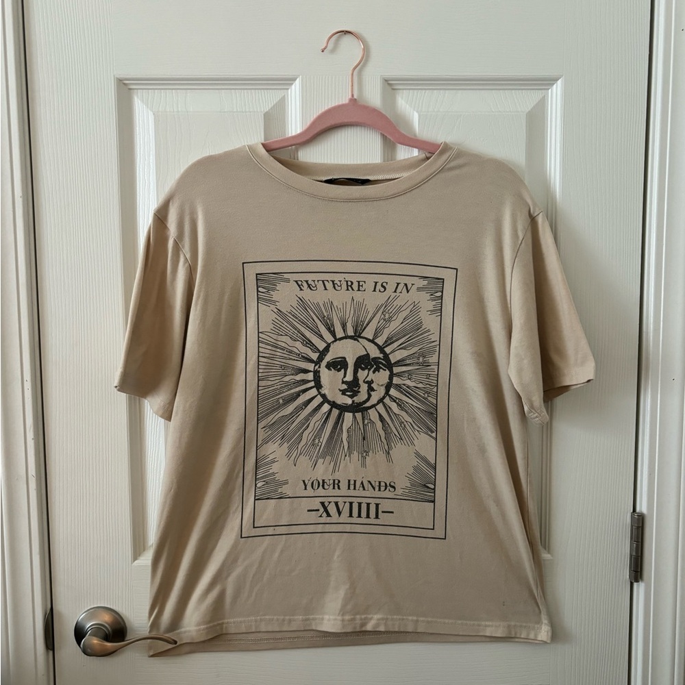 This shirt has been worn but loved dearly.
